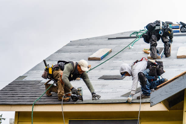 Professional Storm Damage Roof Repair technician working in Wantagh, NY